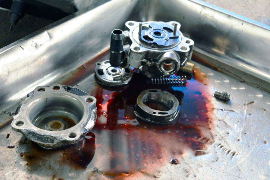  leak in the oil system or broken engine parts. 